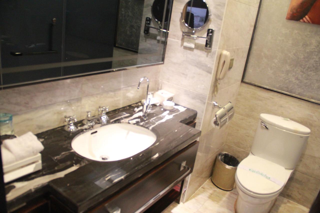 Huangjingang Holiday Hotel Jiexiu Oda fotoğraf
