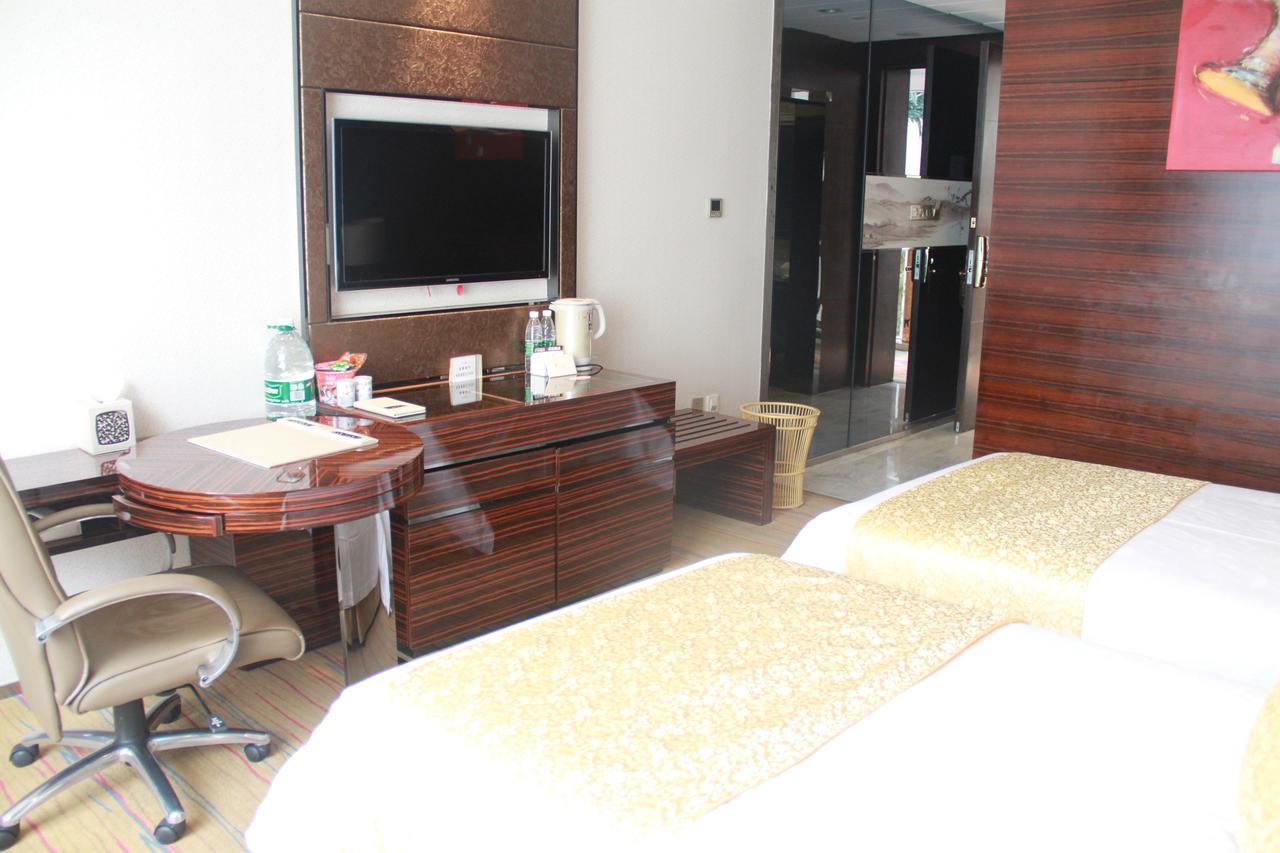 Huangjingang Holiday Hotel Jiexiu Oda fotoğraf